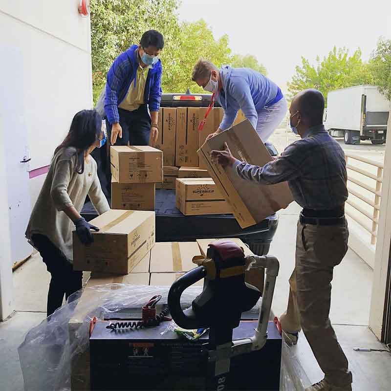 Parrot Courier Service team loading parcels for dispatch